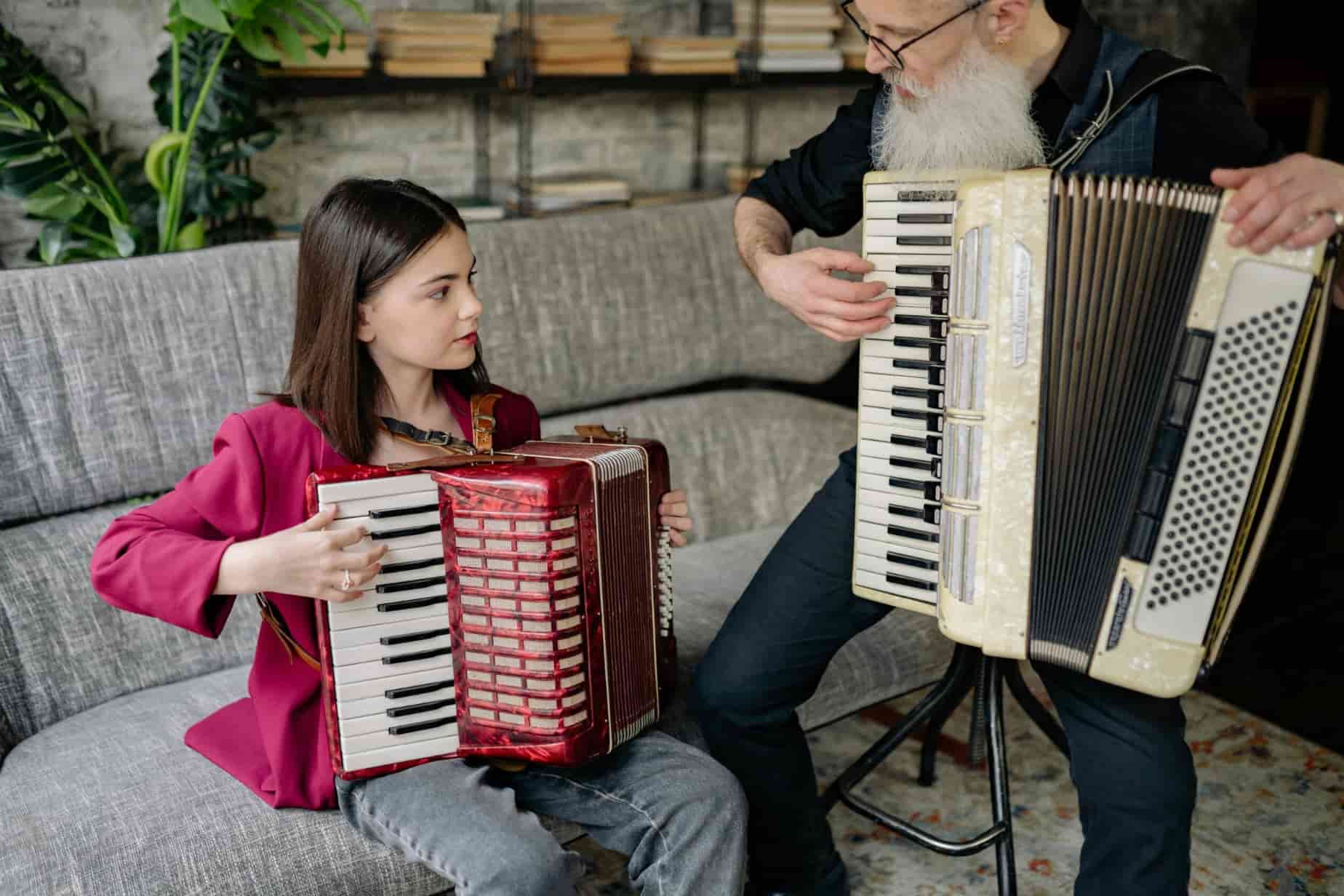 Girl taking accordion lessons