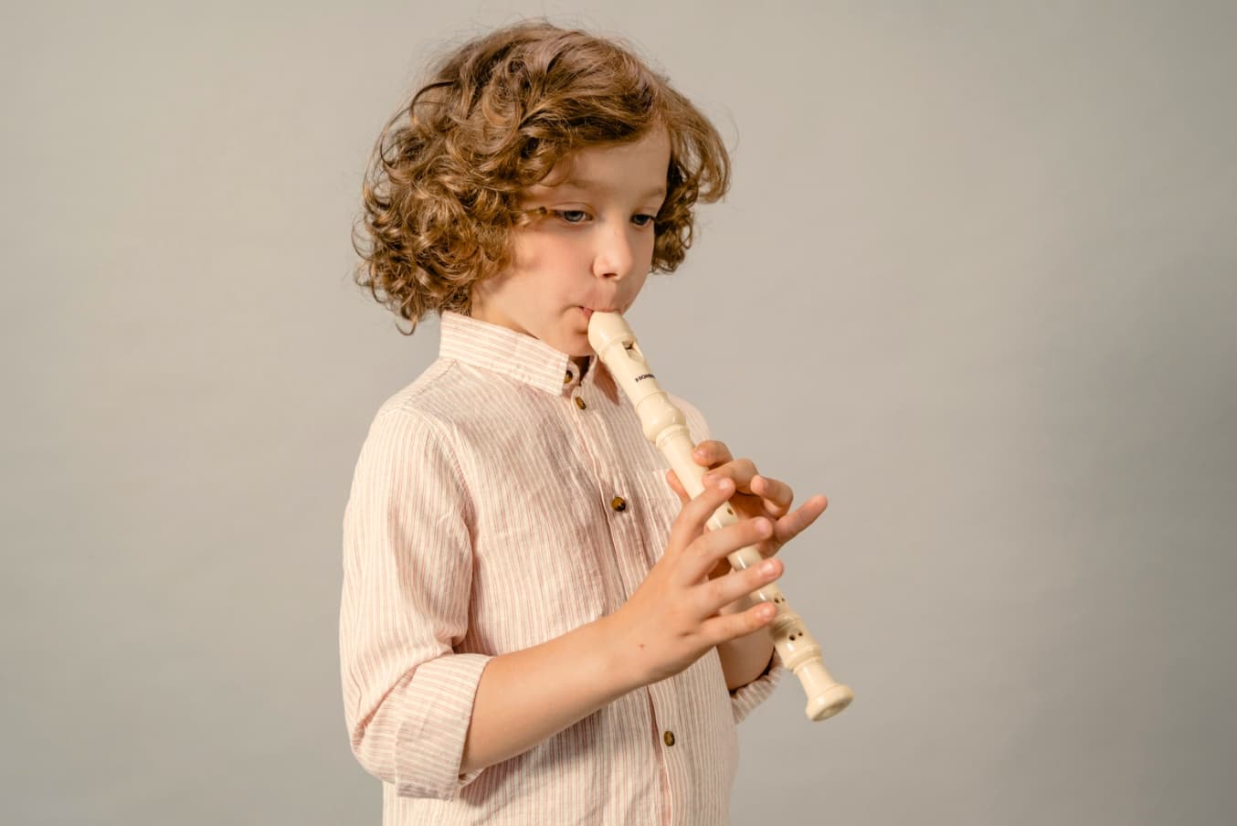 Kid in recorder lessons