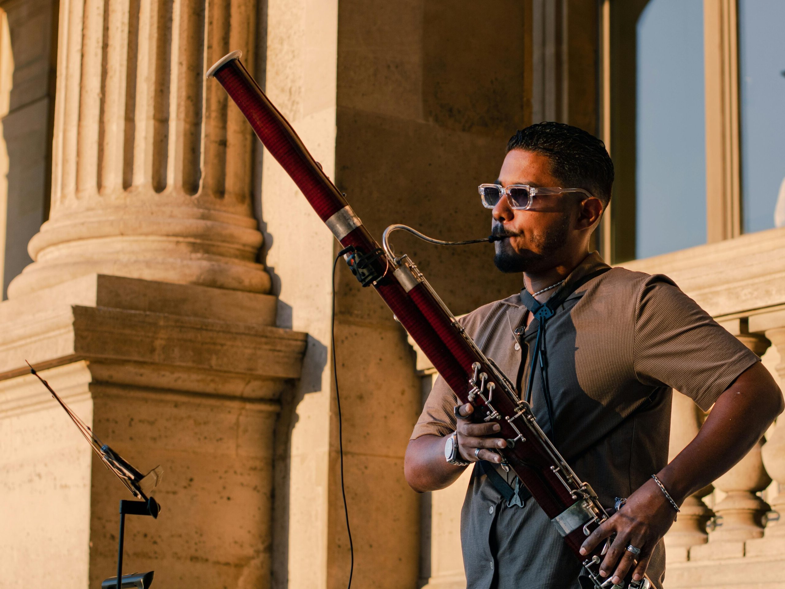 Man playing bassoon with glasses