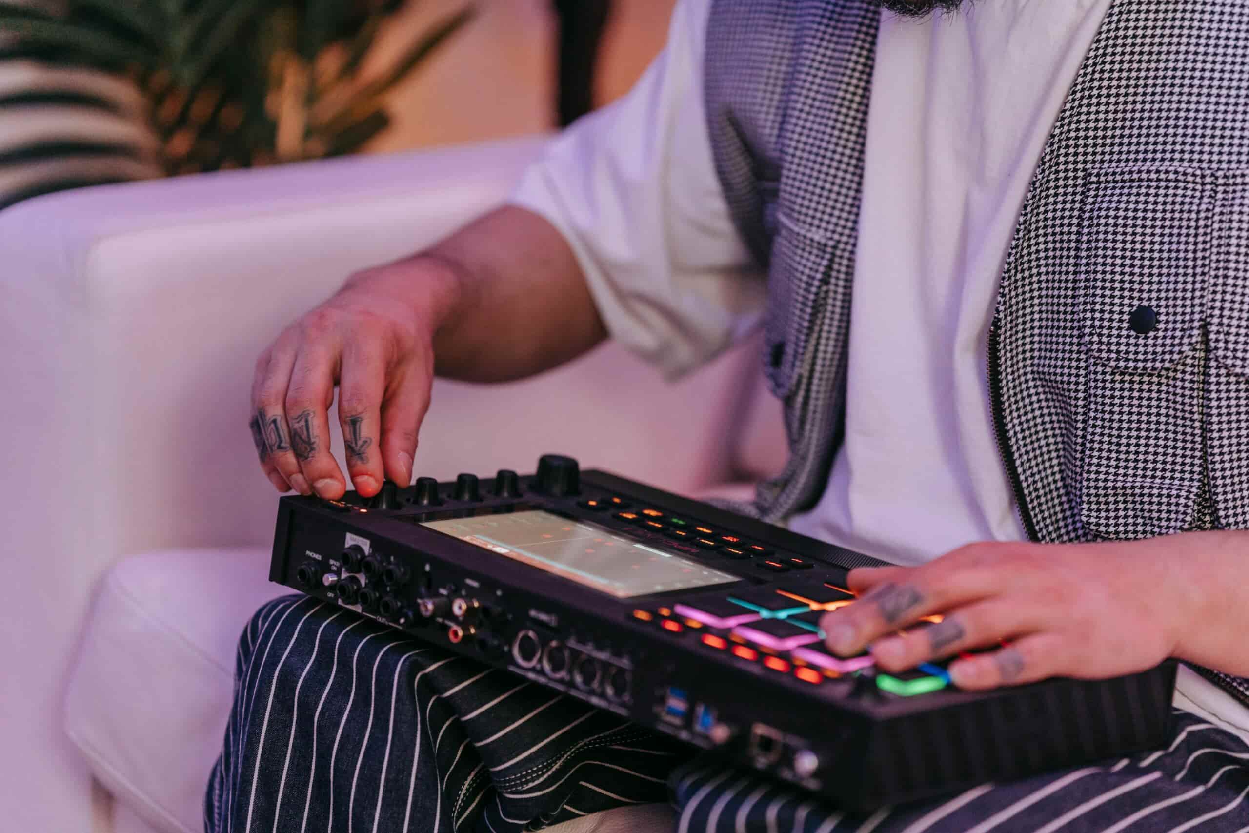 Man mixing on ableton, hand shot