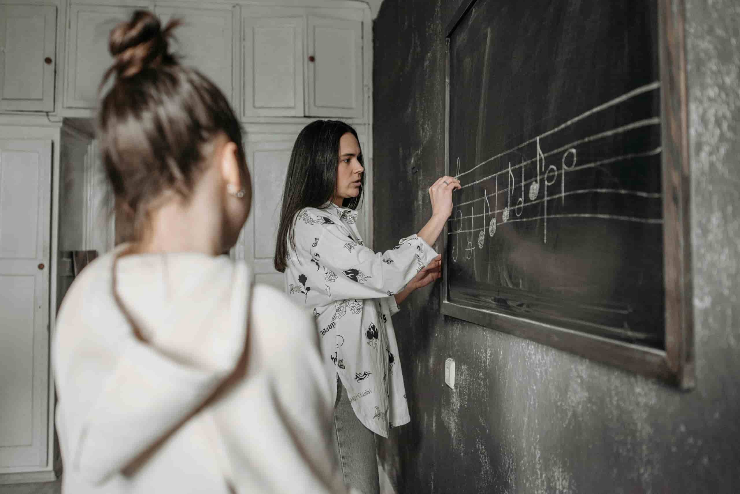 Girl taking music theory lessons