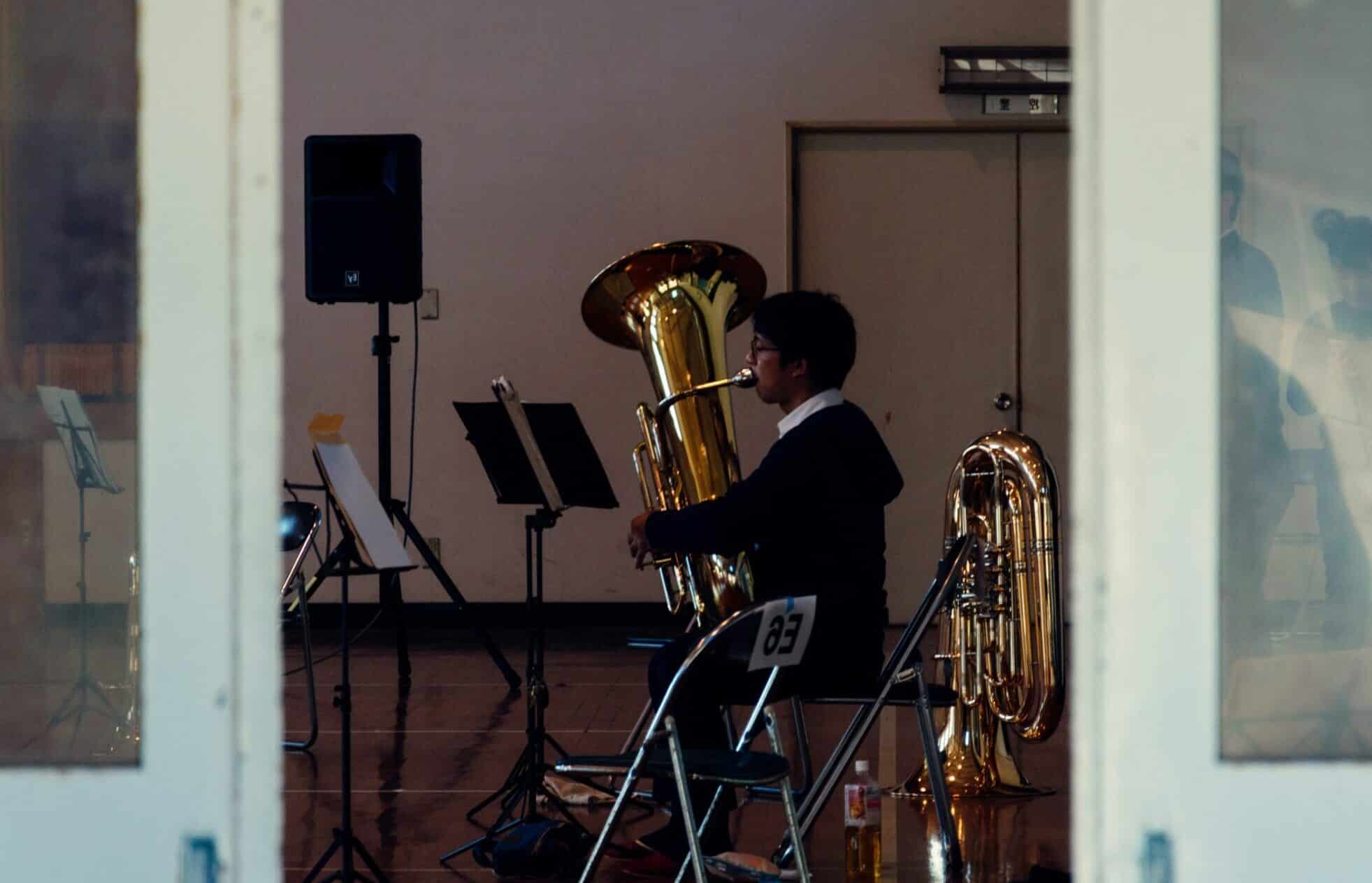 Boy taking tuba lessons