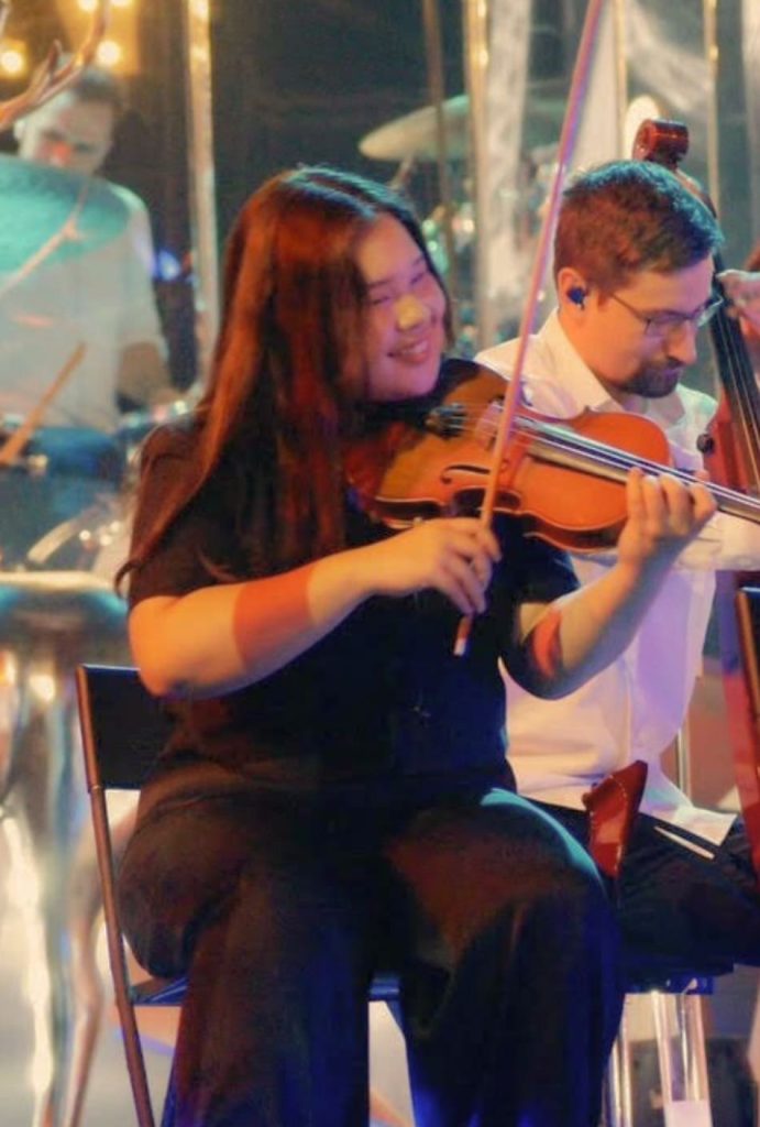 Morgan, violin and music theory teacher