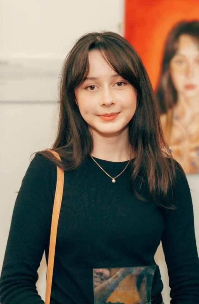 Olivia, flute, piccolo, and music theory teacher