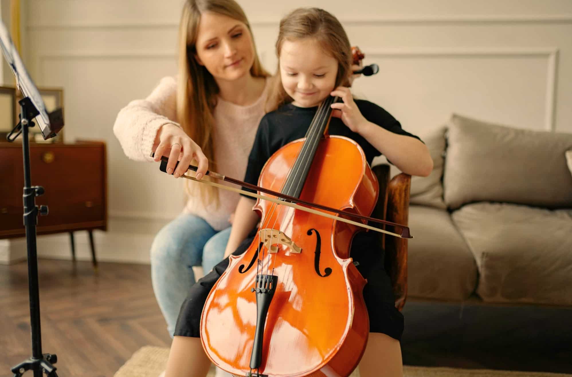 Cello student during cello lessons with teacher