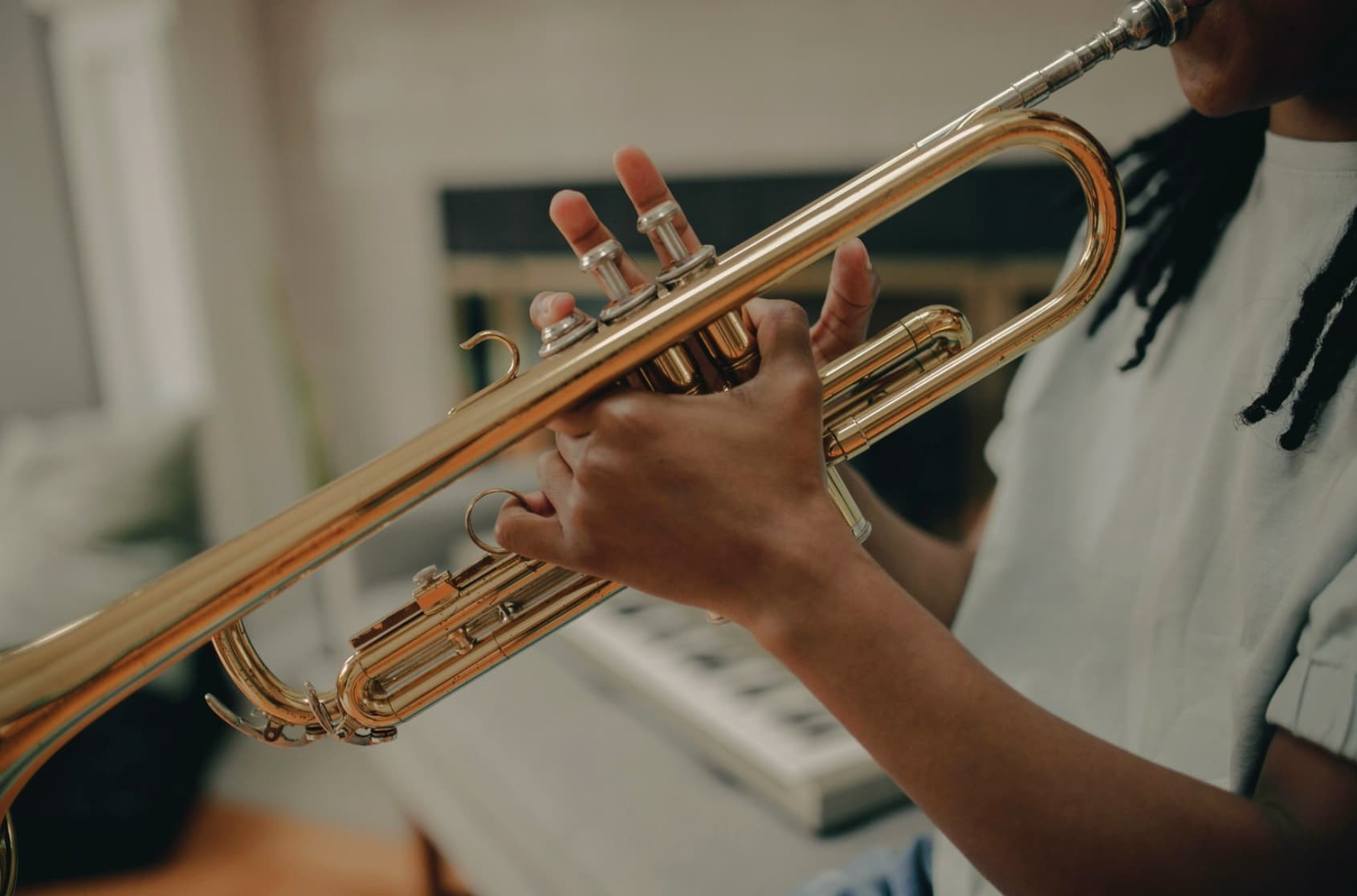 Trumpet side view with girl player