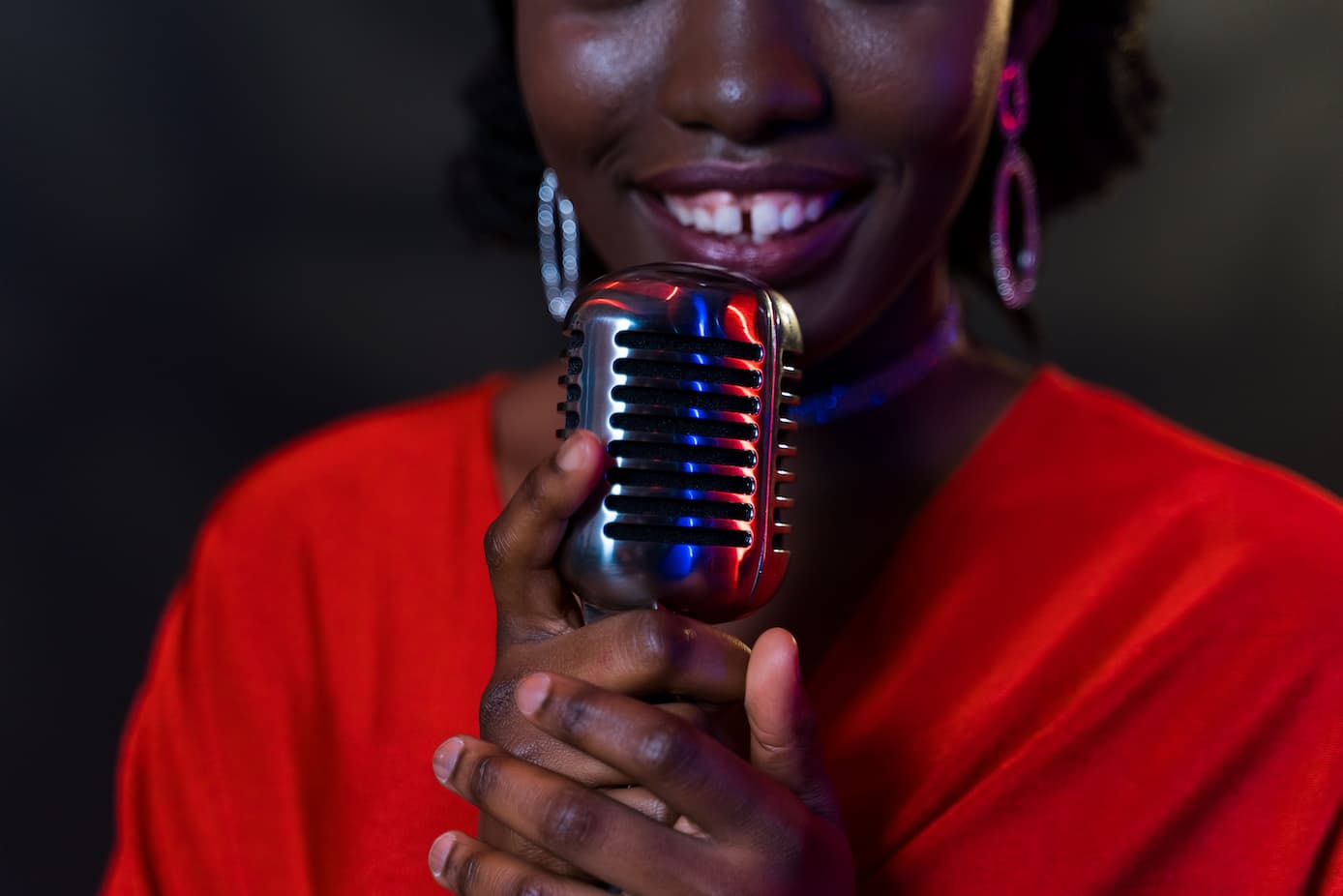 Woman singing in microphone