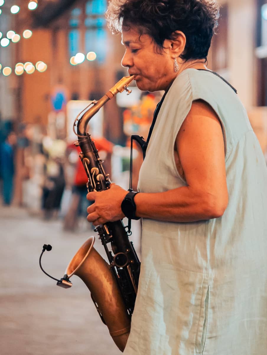 woman playing saxophone