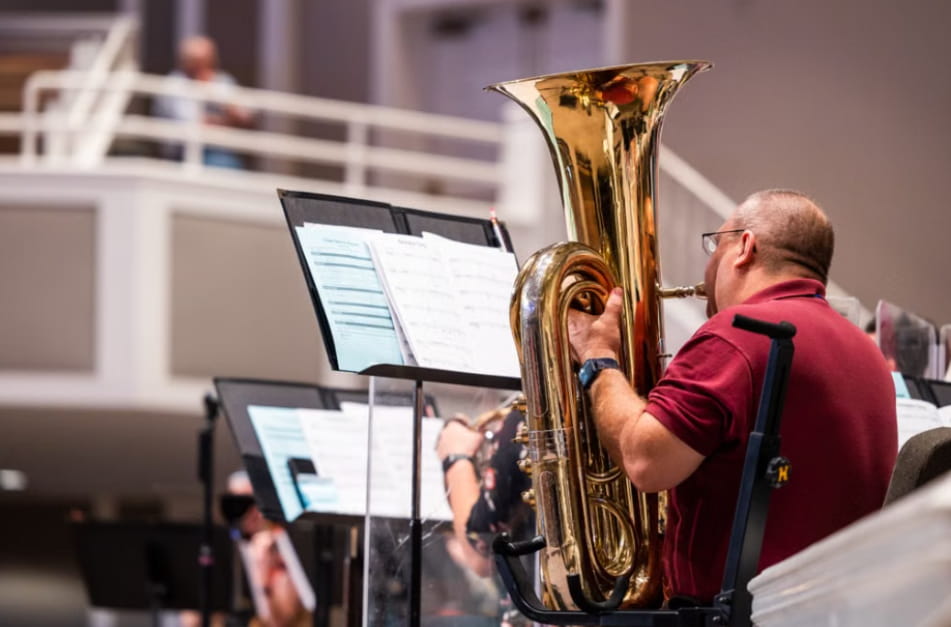 A man practicing tuba