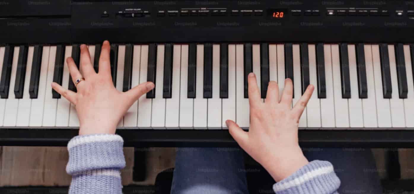 Piano lessons North Shore: a student at the piano