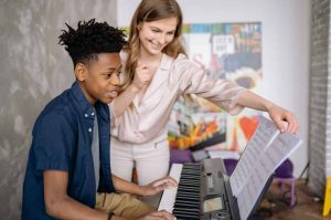 private piano lessons teacher and student